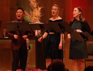 Ace Gangoso, Sarah Ponder, and Cari Plachy singing